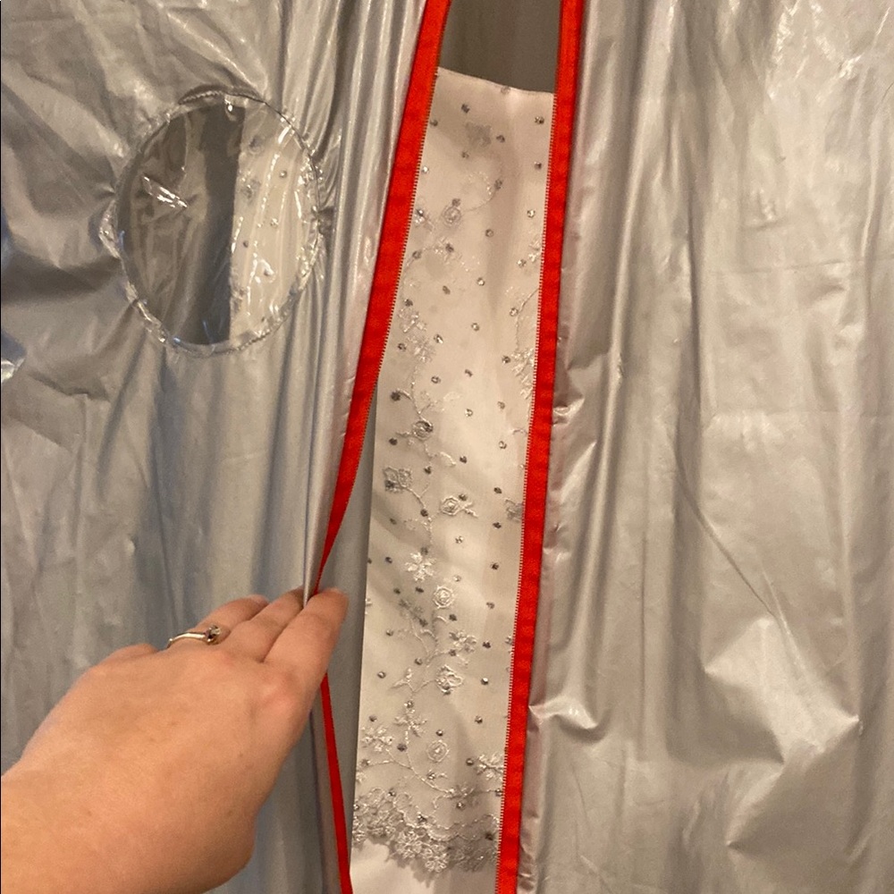 Elegant White Wedding Dress with Intricate Embroidery - Picture 14 of 14